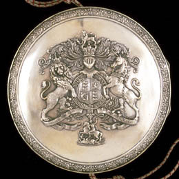 This silver case contains the wax seal with the Royal insignia.